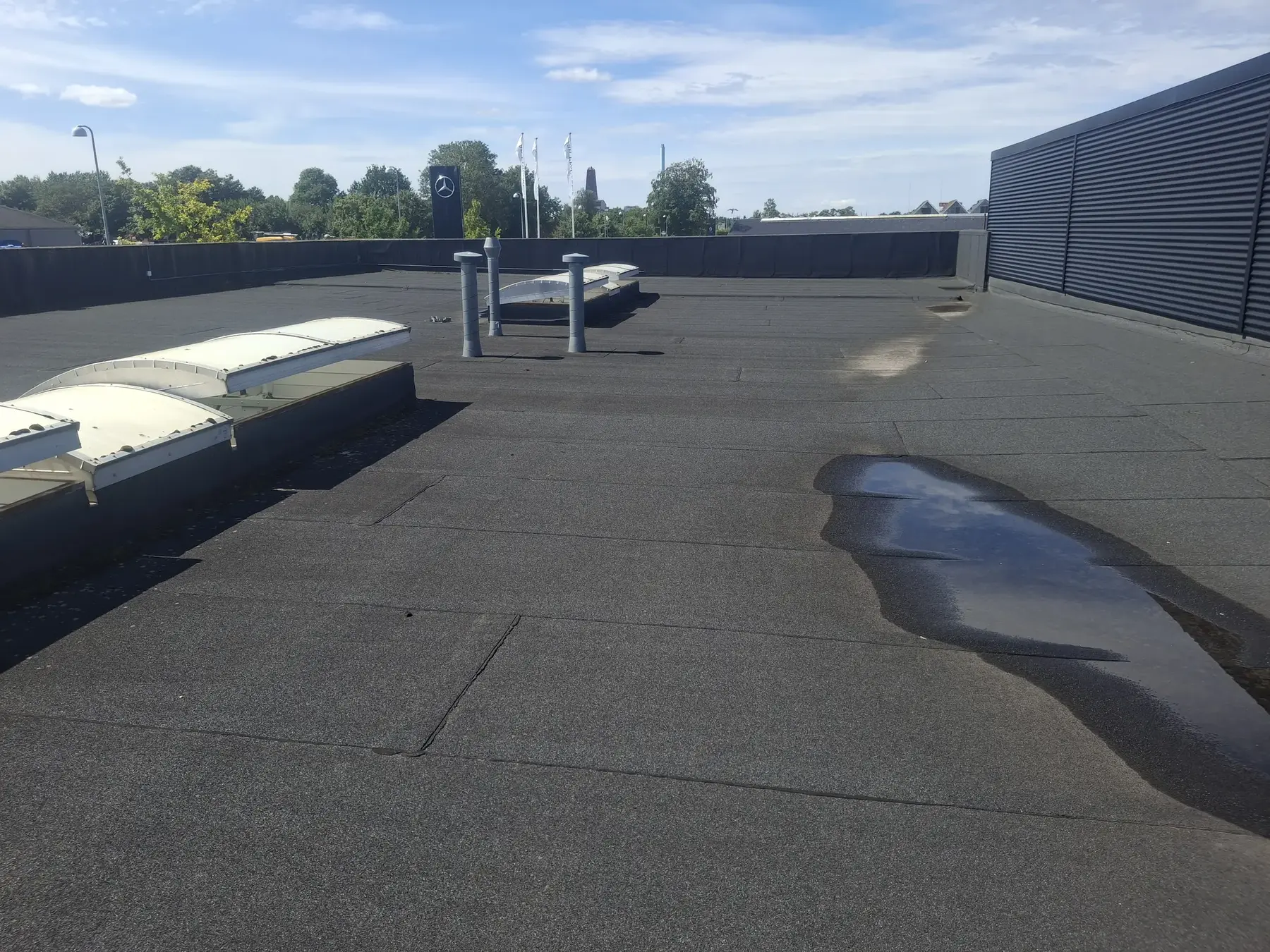 Roof condition and surface water documented for follow-up