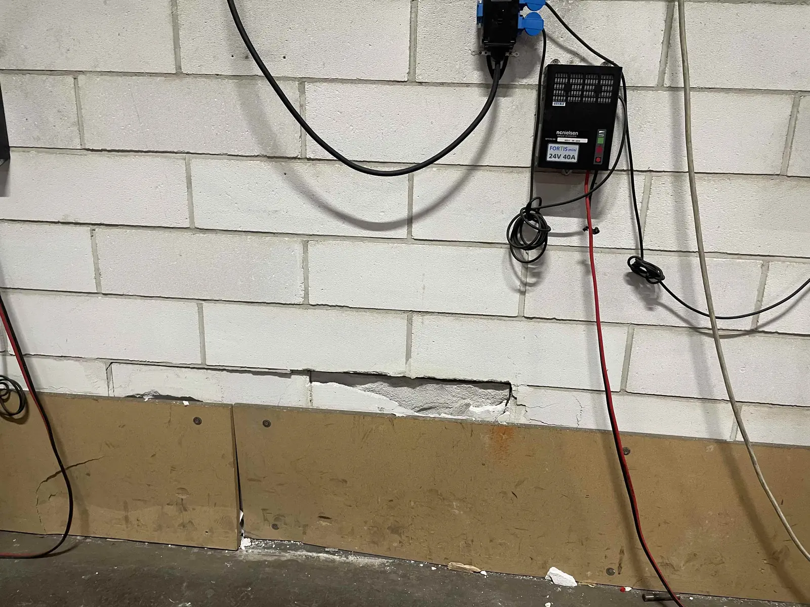 Wall finishes and mounted electrical equipment in a service area