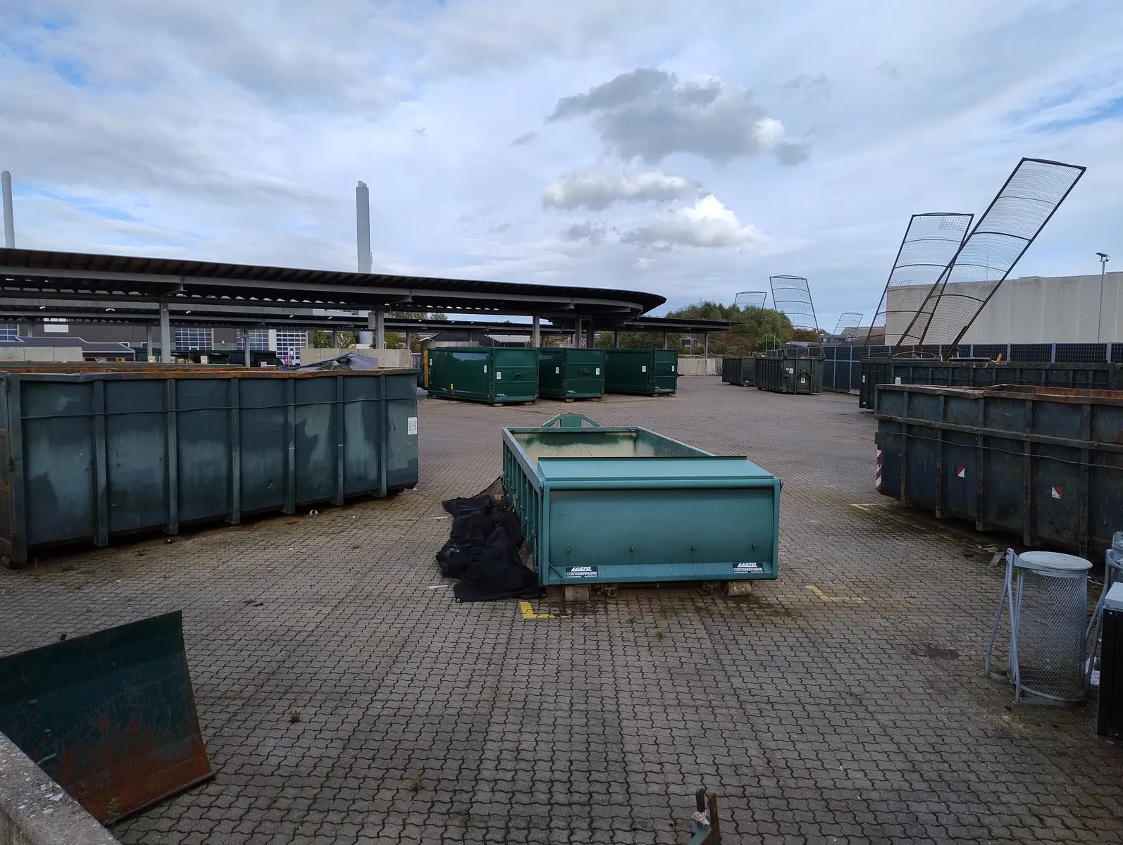 Waste-container yard and surrounding hardstanding